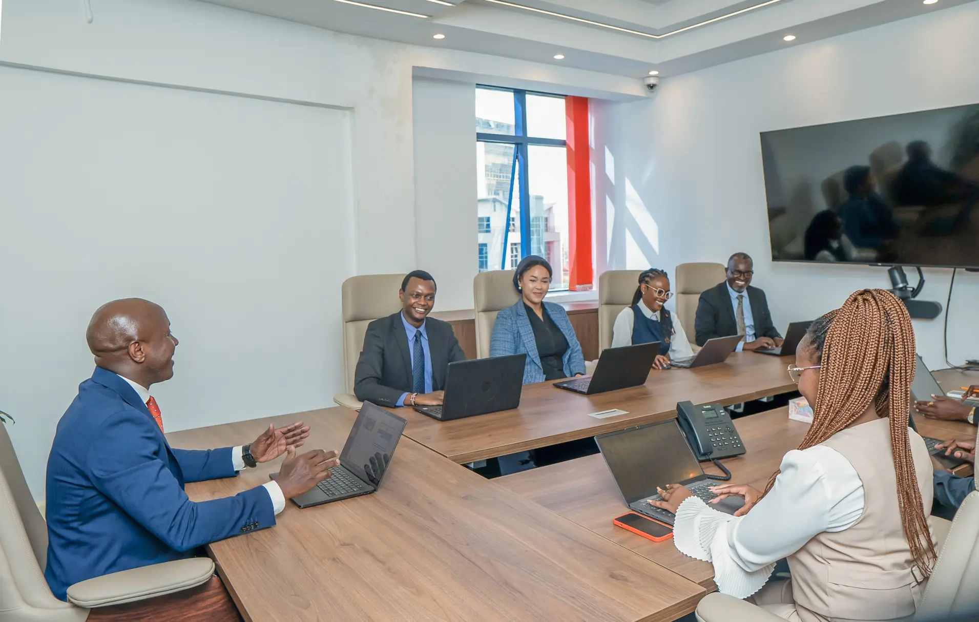 RLC Advocates in the boardroom with their captain